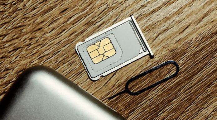 Insert sim card into smartphone.