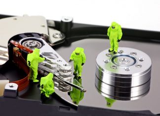 hazmat team inspecting a hard drive